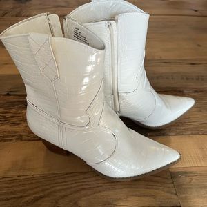 White crocodile cowboy short boots.